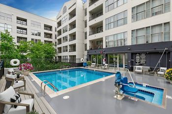 Outdoor lounge with luxurious pool & spa
